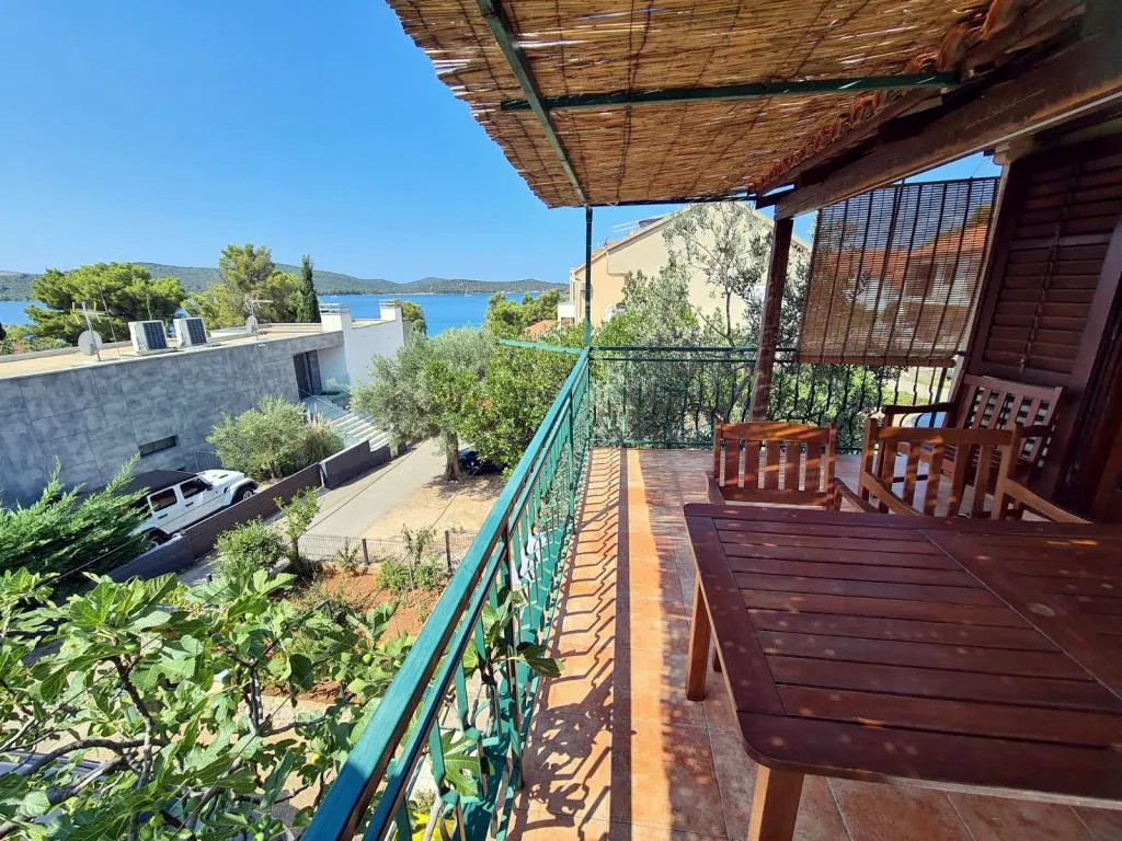 The terrace railing, looking out to the bay